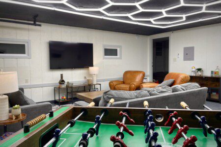 The Waldron Lake Retreat Bonus Game Room: Unwind and have a blast! From foosball and poker nights to cozy movie marathons on the 55" Roku TV with YouTubeTV, we've got all the fun vibes covered—complete with awesome lighting and board games!