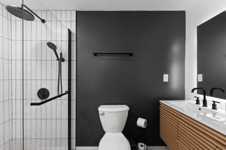 Your private spa retreat 🛁✨ The master bath in Bedroom 1 features a rainfall shower + double vanity for ultimate comfort + style. Relax, refresh, and recharge at Notre Dame Pool Haus.