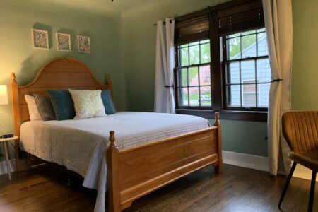 Bedroom #2 with highly rated Lucid queen mattress; night stand with a clock w/ USB and outlets to make charging devices super convenient