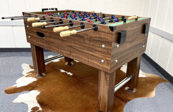 The Waldron Lake Retreat Bonus Game Room: Unwind and have a blast! From foosball and poker nights to cozy movie marathons on the 55" Roku TV with YouTubeTV, we've got all the fun vibes covered—complete with awesome lighting and board games!