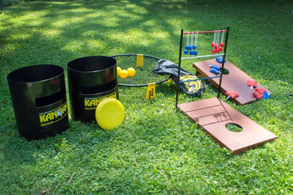 Backyard Retreat - backyard games available in shed: 1) Spikeball 2) Kan Jam 3) Corn Hole 4) Ladder Golf