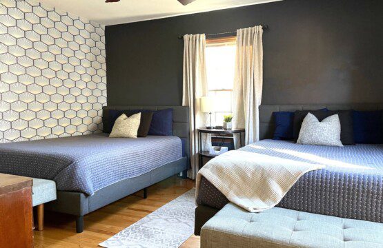 Upstairs Bedroom #1 - with highly rated Lucid queen mattress; a clock w/ USB and outlets to make charging devices super convenient; 43" Roku Smart TV