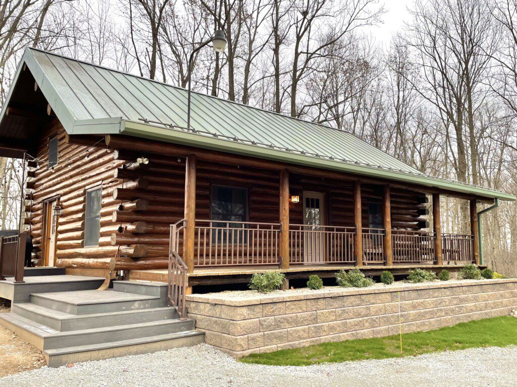 Trillium Lane Cabin - sit back and relax to enjoy nature all around you on the front porch in complete seclusion