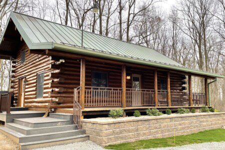 Trillium Lane Cabin - sit back and relax to enjoy nature all around you on the front porch in complete seclusion