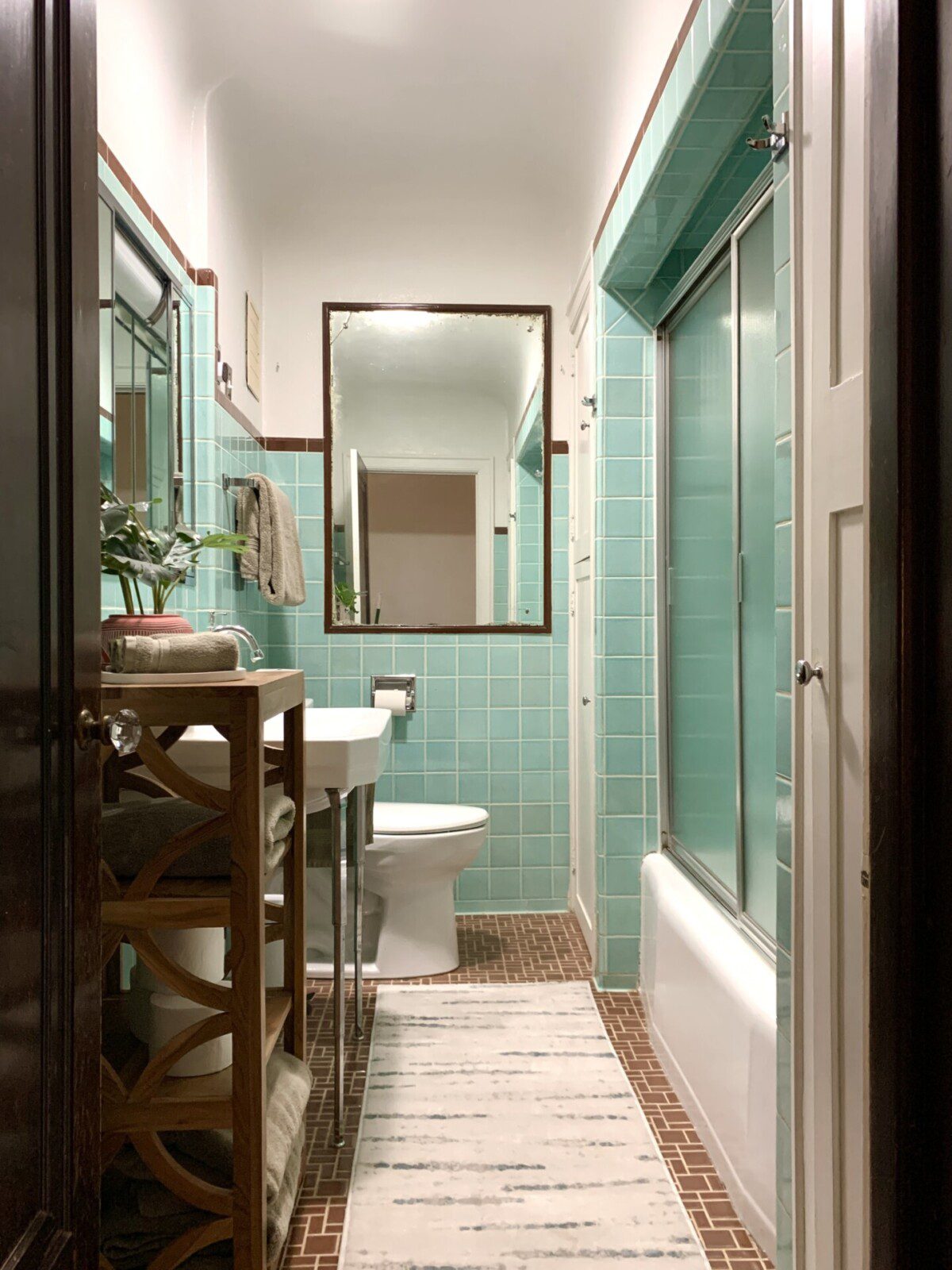 Main floor bathroom with shower and tub combination.
