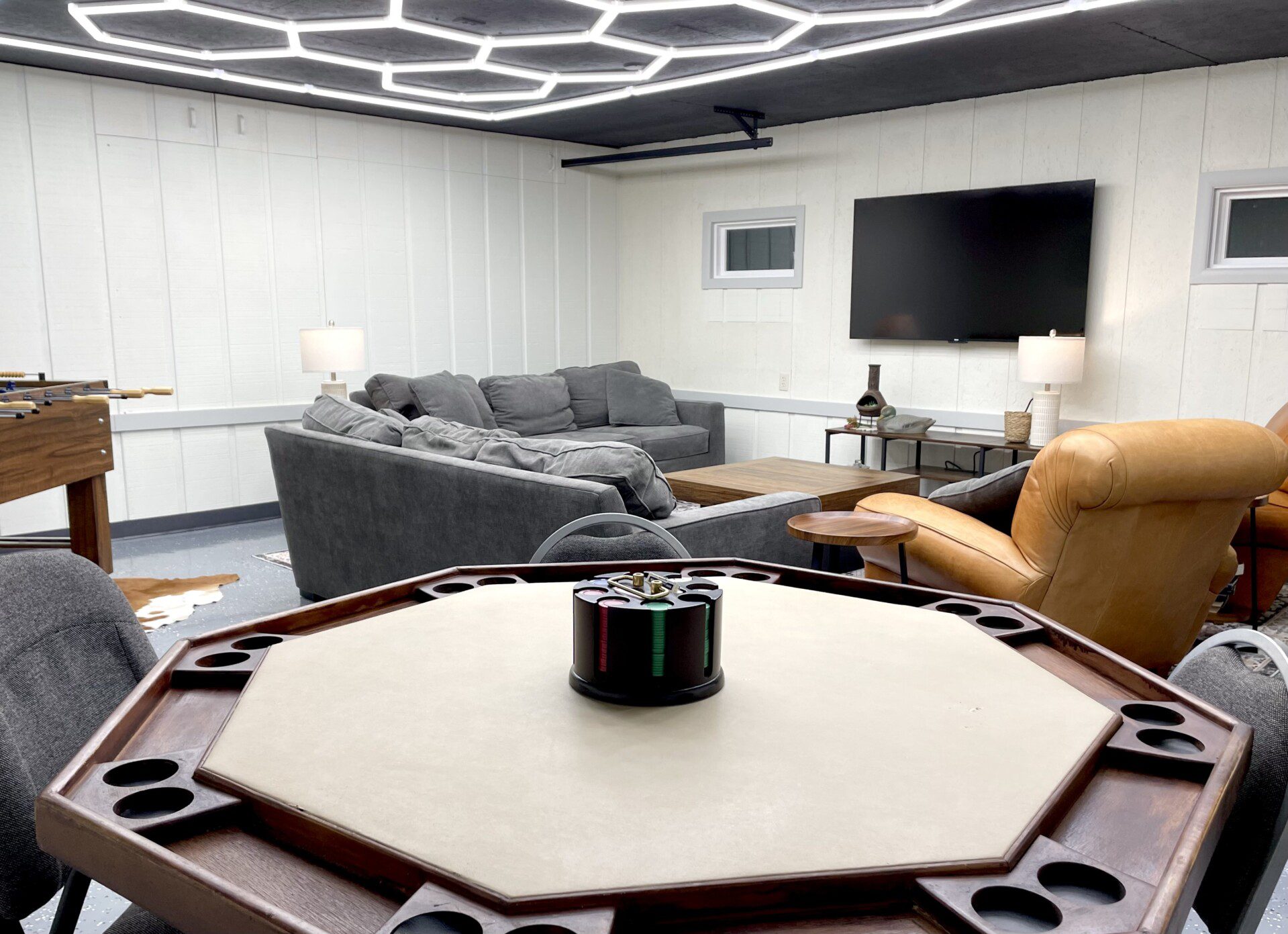 The Waldron Lake Retreat Bonus Game Room: Unwind and have a blast! From foosball and poker nights to cozy movie marathons on the 55" Roku TV with YouTubeTV, we've got all the fun vibes covered—complete with awesome lighting and board games!