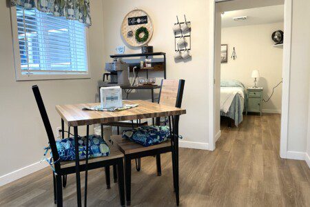 Stone Lake Cottage Retreat: Small but mighty — a dining table for meals or games, plus a stocked coffee bar just steps away.