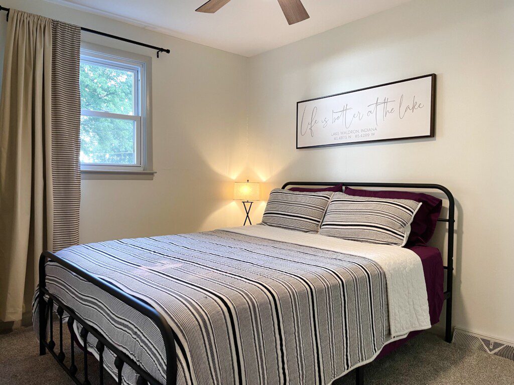 The Waldron Lake Retreat Bedroom #3: 
✔ Queen Bed with Pillows, Linens, and Sheets
✔ Touch Reading Lamps with USB plug-ins