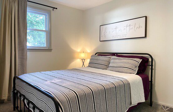The Waldron Lake Retreat Bedroom #3: 
✔ Queen Bed with Pillows, Linens, and Sheets
✔ Touch Reading Lamps with USB plug-ins