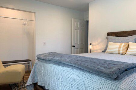 Bedroom #2 - comfortable queen bed; USB clock right beside the bed for all your charging needs