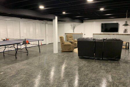 Finished basement! Try your hand at ping pong, compete on a small basketball hoop, or simply relax and watch TV on the 55" TCL Roku TV with complimentary YouTubeTV access.