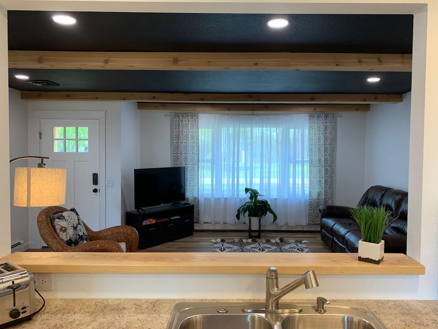 View from kitchen into living room (open concept)