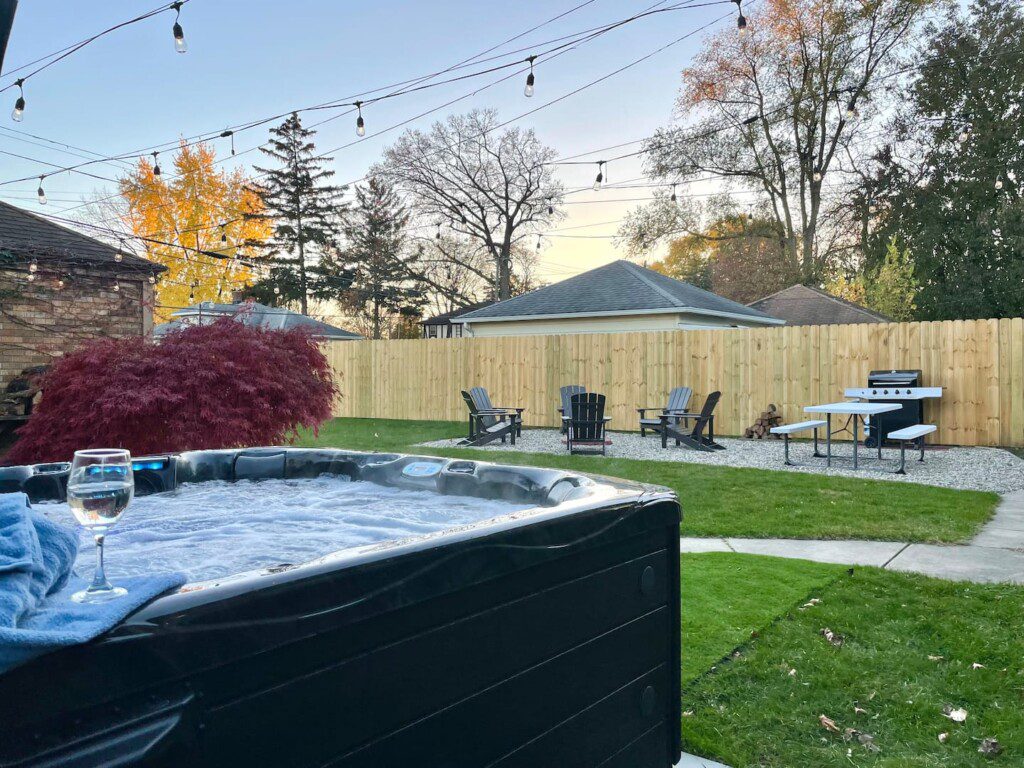 TheBrickHouse Backyard Oasis - hot tub, grill, lights, firepit, privacy fence, did I mention HOT TUB!!??