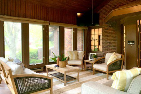 Four season sitting room - enjoy the beautiful landscaped property from the comfort of a sitting room, or enjoy a movie on the 50" Roku Smart TV