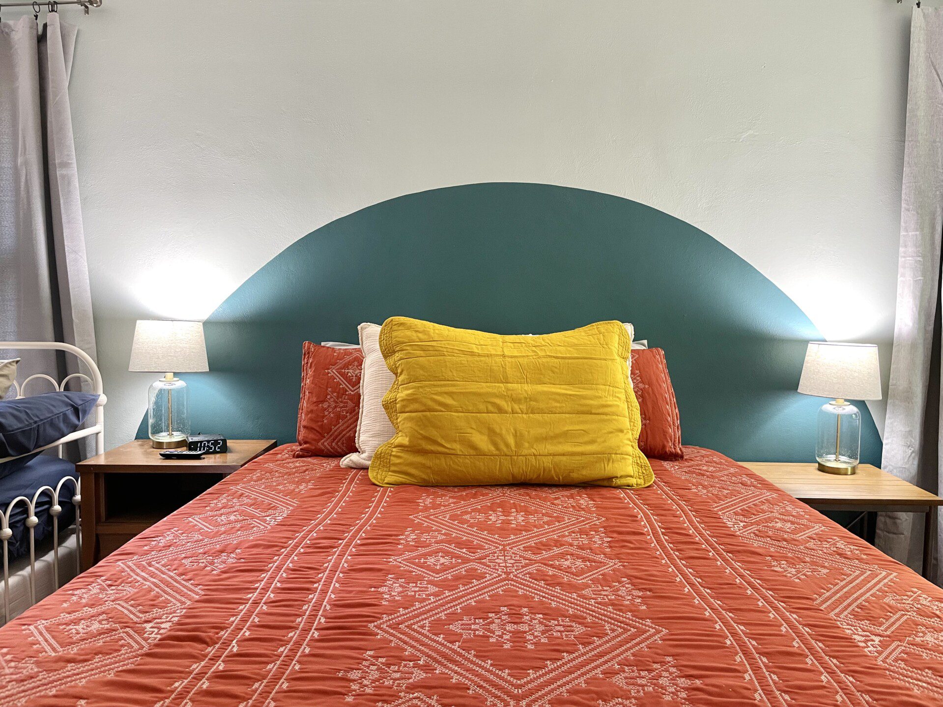 Bedroom #1 with highly rated Lucid queen mattress, and 4 twin beds; a clock w/ USB and outlets to make charging devices super convenient; 43" Roku Smart TV