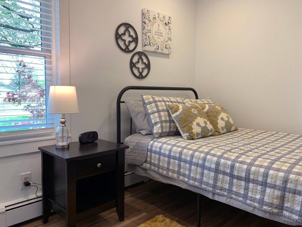 Bedroom #3 - comfortable full bed; USB clock right beside the bed for all your charging needs