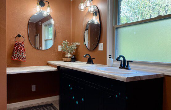 Bathroom #1 with shower/tub combination - furnished with towels, washcloths, soap/shampoo/hairdryer, and more