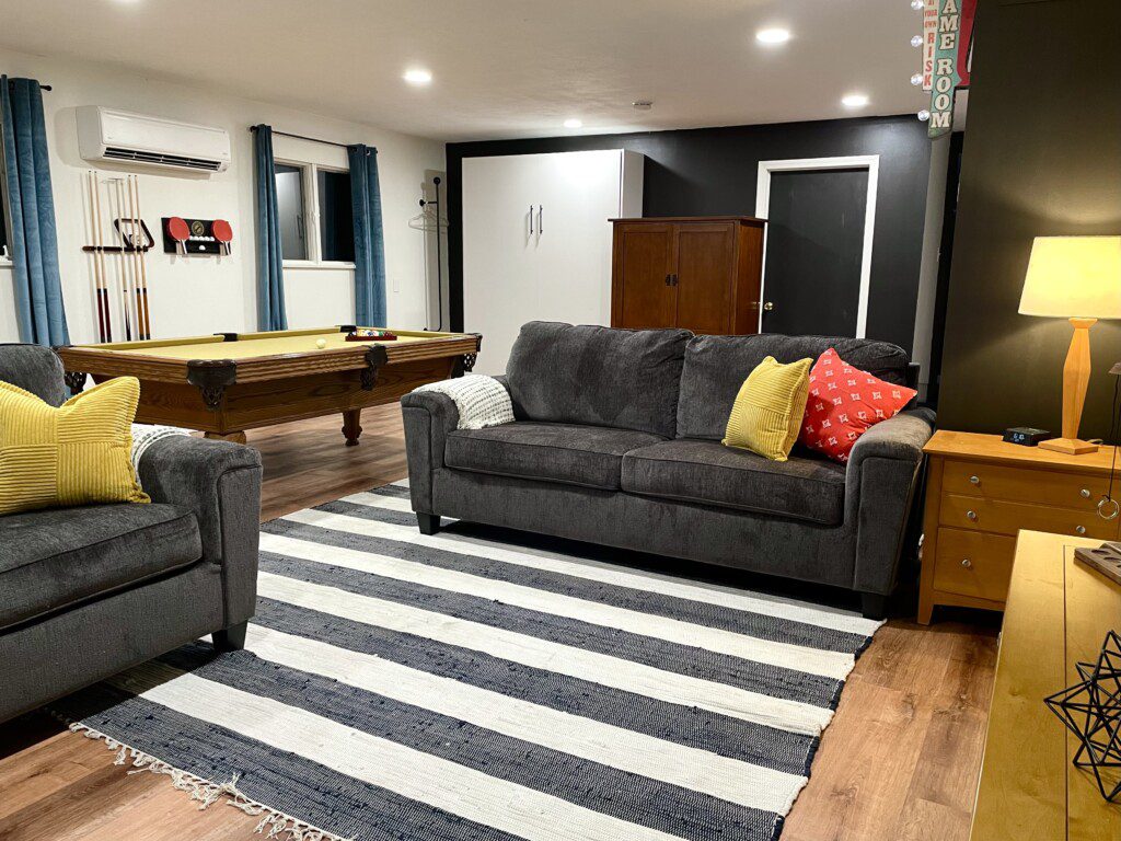 🎯 The Ultimate Game Room! 🎮
Play pool, battle on the digital game board, hit the giant dart board & Connect Four, enjoy retro gaming, or stream on the 65" Roku TV — plus cozy queen Murphy beds & sofas (sleeps 8). Endless fun for everyone!
