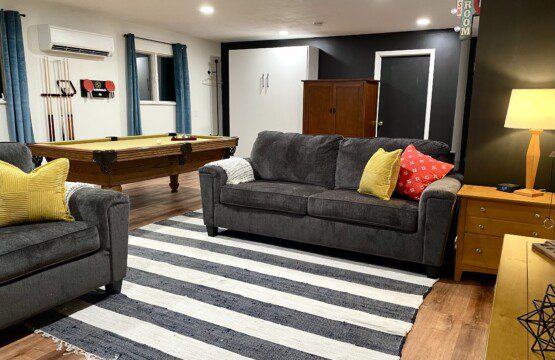 🎯 The Ultimate Game Room! 🎮
Play pool, battle on the digital game board, hit the giant dart board & Connect Four, enjoy retro gaming, or stream on the 65" Roku TV — plus cozy queen Murphy beds & sofas (sleeps 8). Endless fun for everyone!