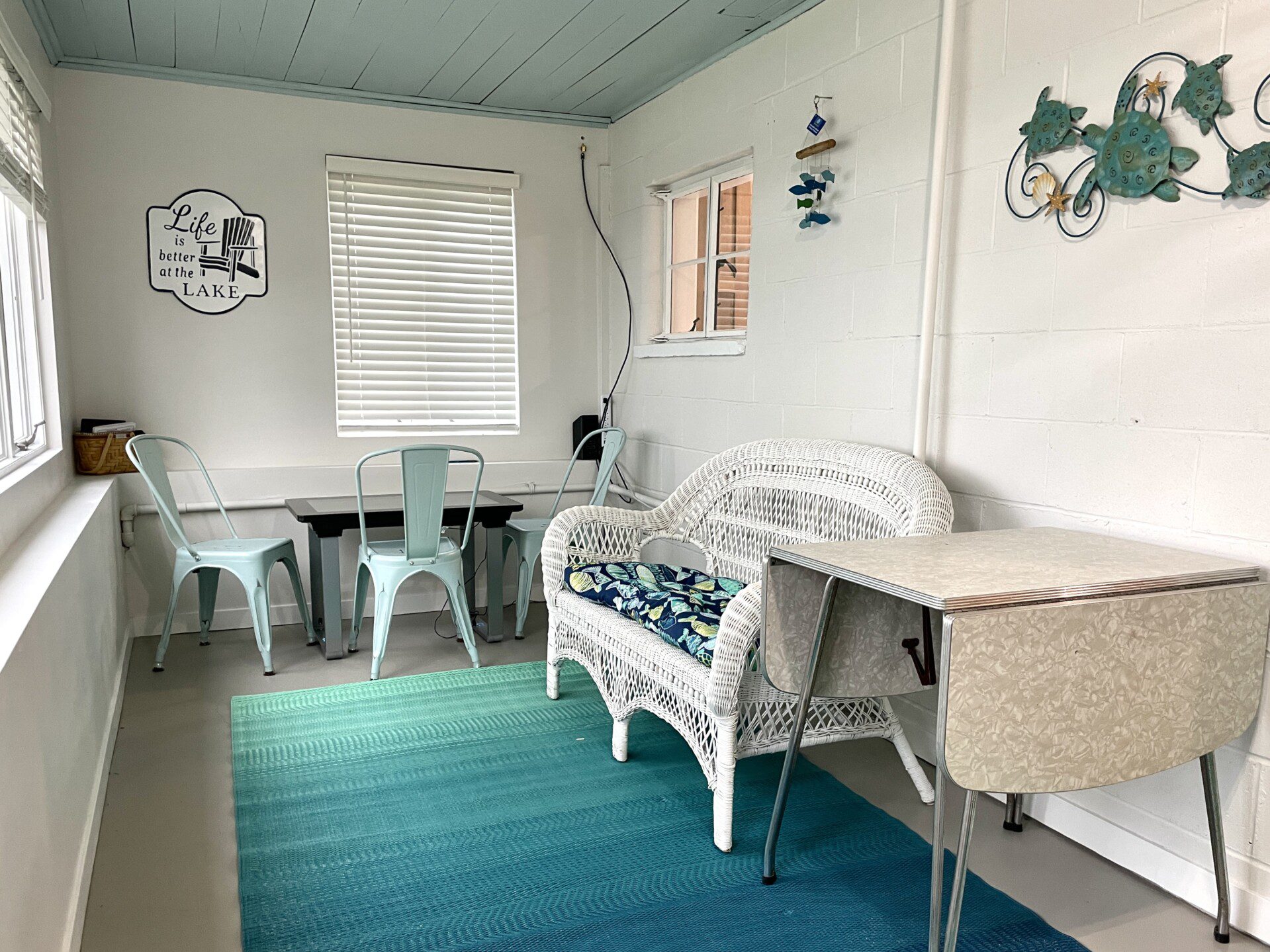 Stone Lake Cottage Retreat: Grab a seat, sip something warm, and soak in the lake view from the entry sitting room.