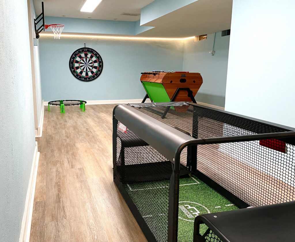 Game On in the Basement! Unwind by the pool, then unleash your competitive spirit in the basement game room - featuring foosball, air hockey, billiards, subsoccer, basketball, giant wall connect four, ball darts and more!