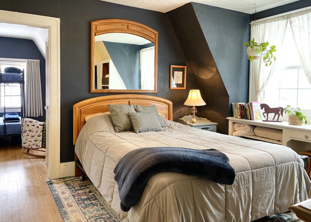 Rest deeply in this serene bedroom retreat 🛌✨ — warm amber lighting, rich tonal bedding, and calming teal tones create an inviting sanctuary where you'll sleep better than you have in months.