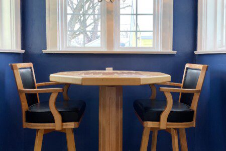 Pull up a chair and settle in 💙🍷 — this bold, navy-accented dining nook sets the perfect mood for lingering over meals, playing games, and making memories with your crew.