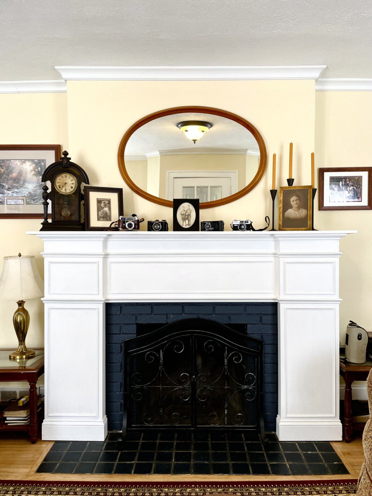 Step back in time and soak in the character of this gorgeous fireplace mantel 🕰️🤍 — with antique touches and a classic oval mirror, it's the kind of charm you'll want to come back to.
